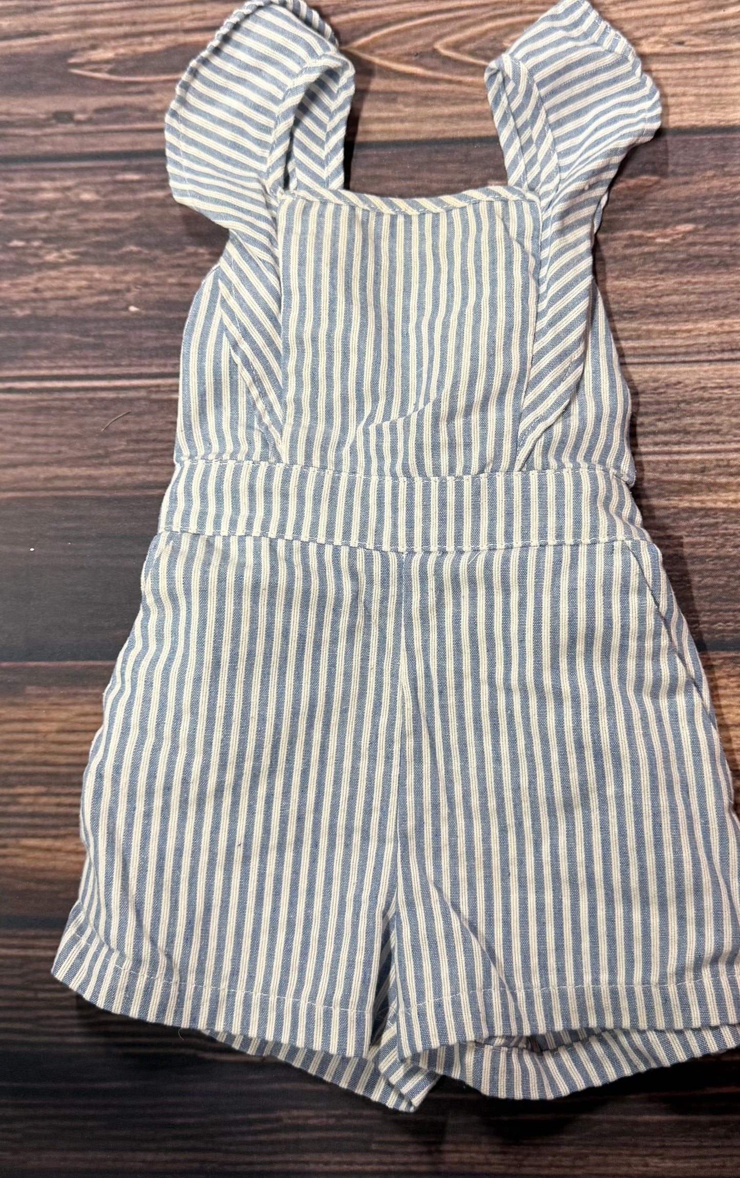 Pink Lily 2T romper..super faint staining