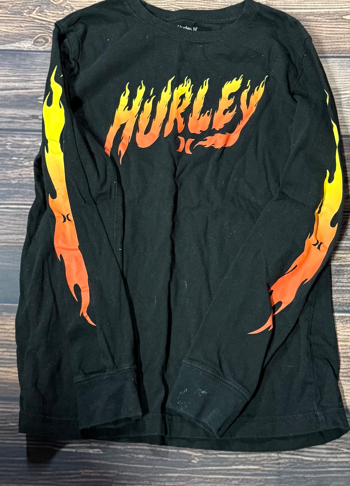 Hurley large..has small staining on cuff