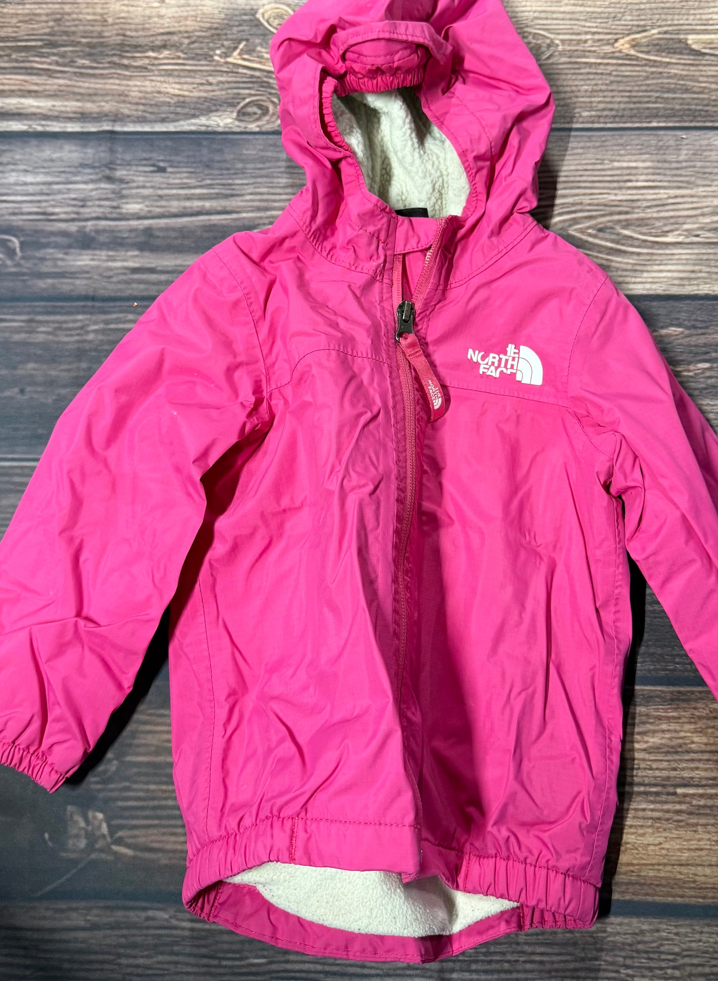 North Face 12-18m..logo peeling
