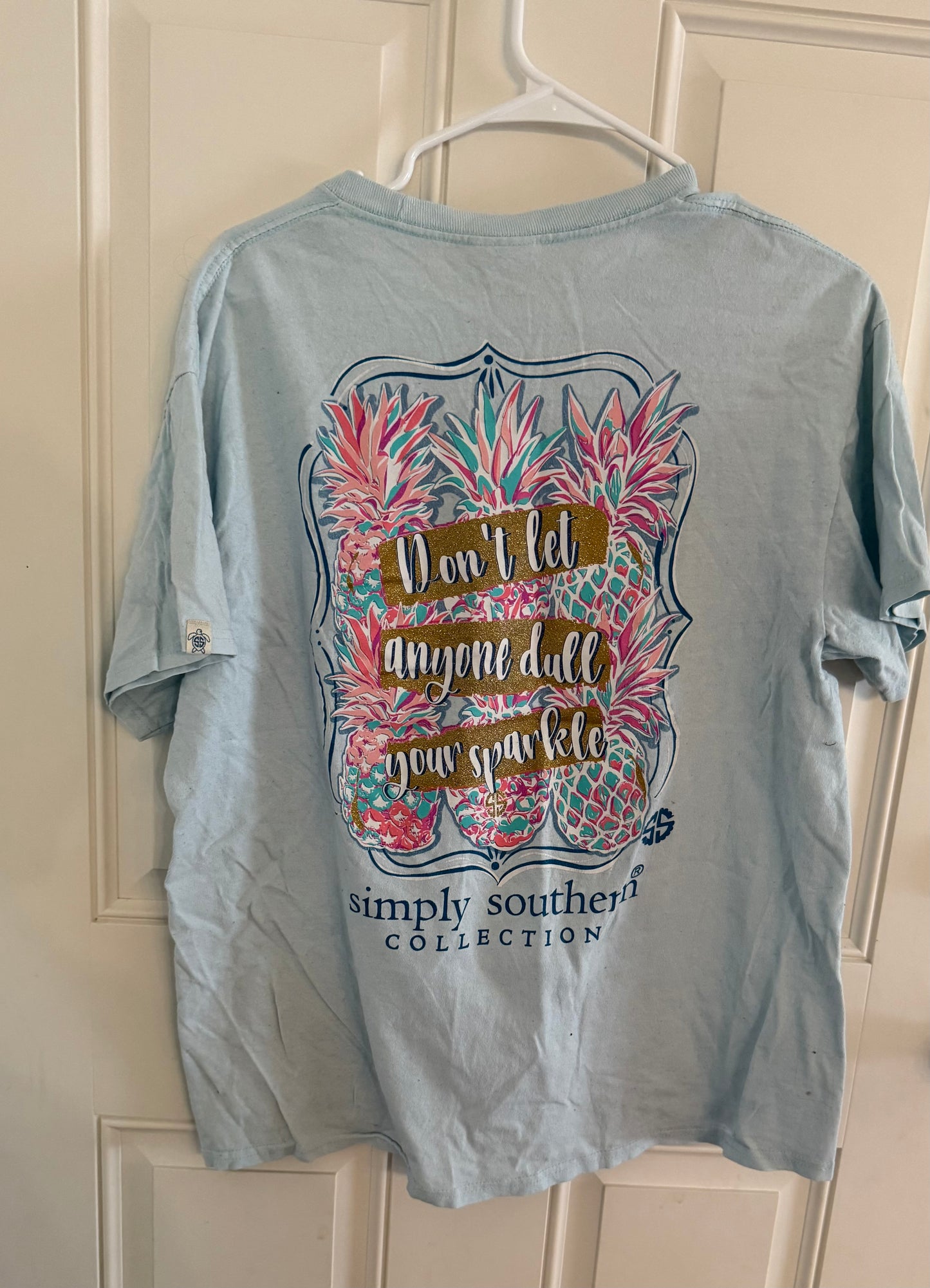 Simply Southern large..back in second pic..has small spots on front