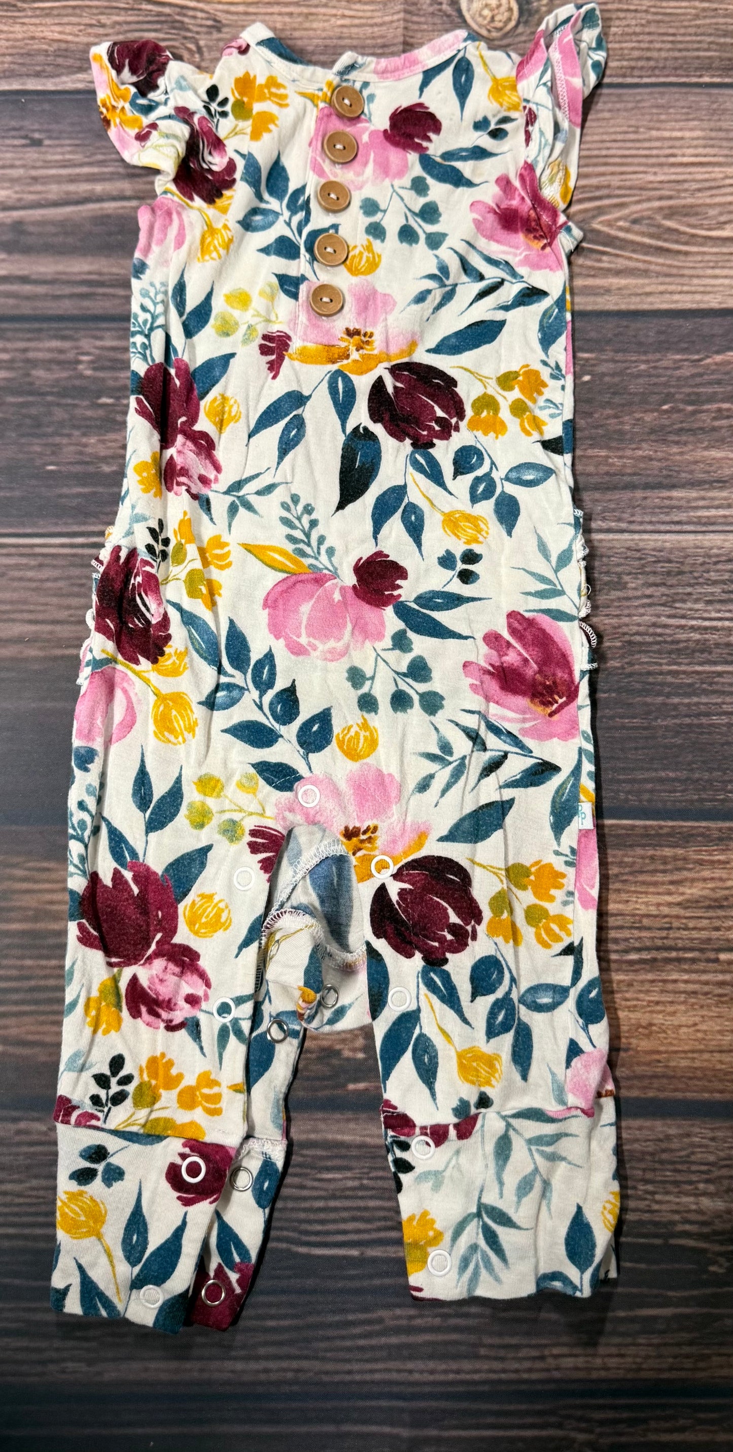 Posh Peanut 6-9m..has a ruffle butt