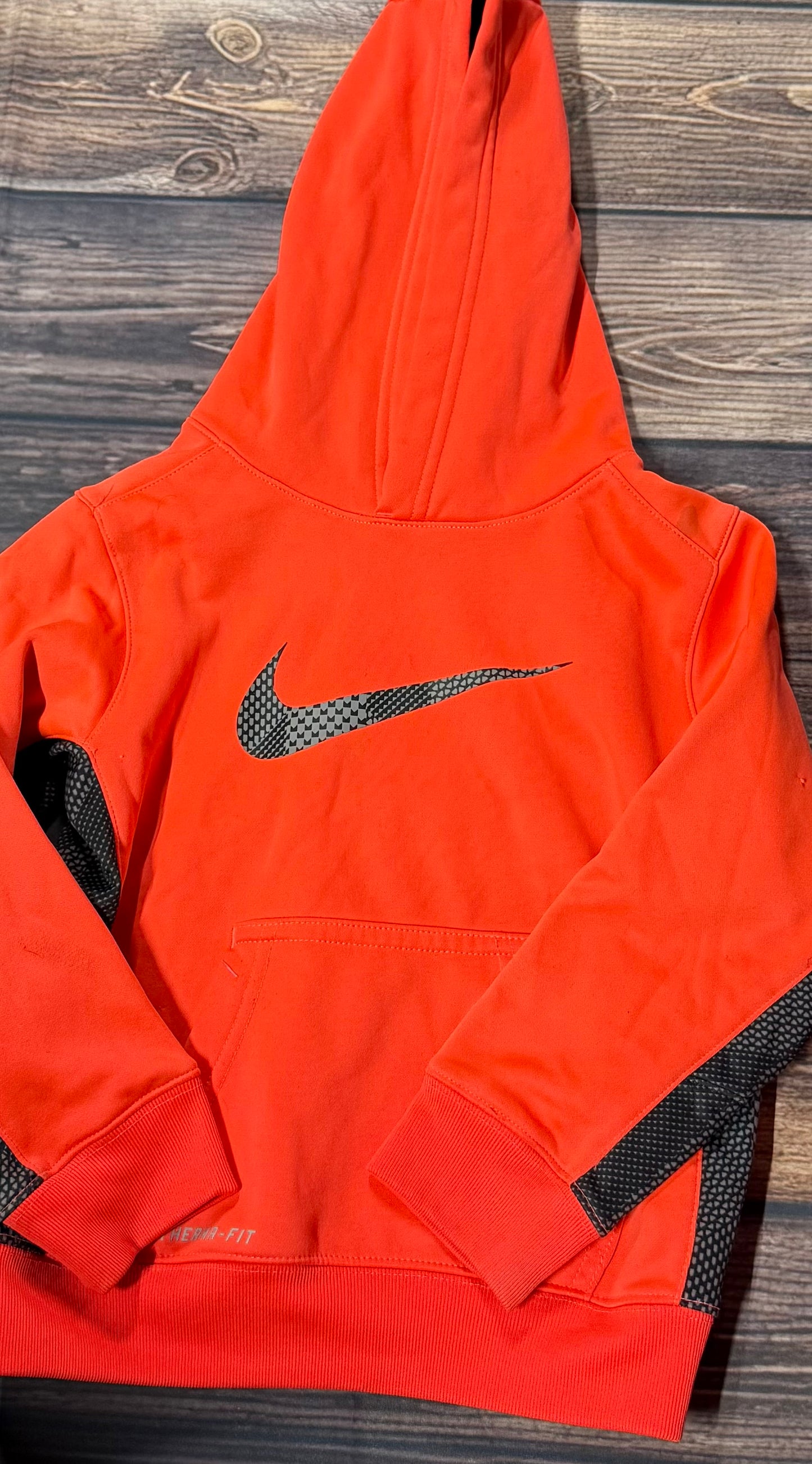 Nike 4..small spot on shoulder