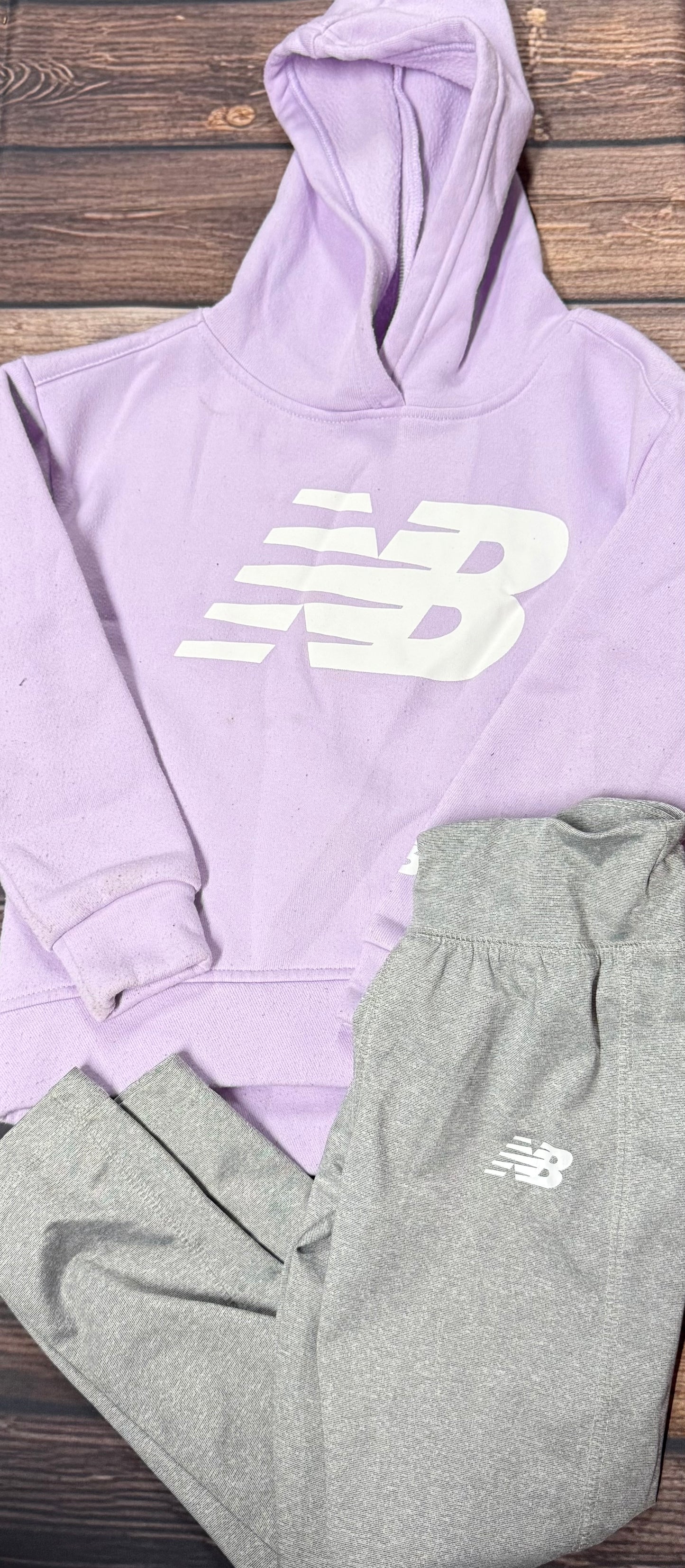 New Balance 5/6..has staining on hoodie