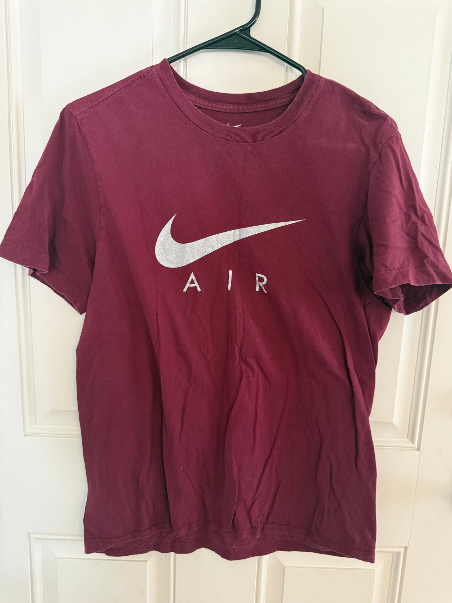 Nike small..small staining by shoulder