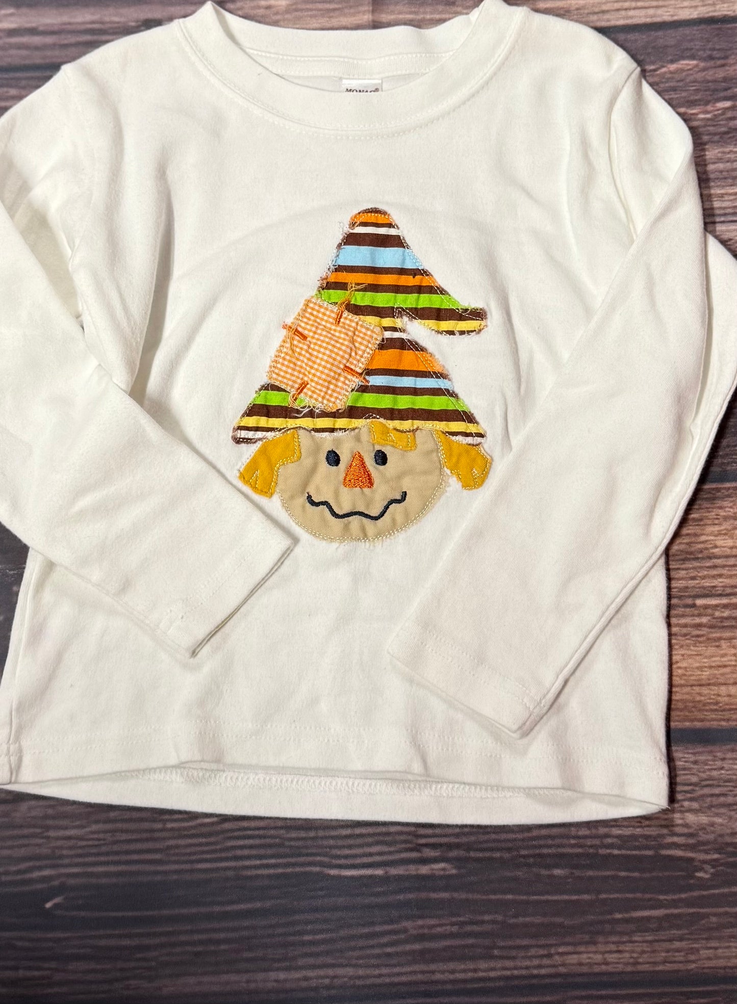 Size 2..small stain on cuff