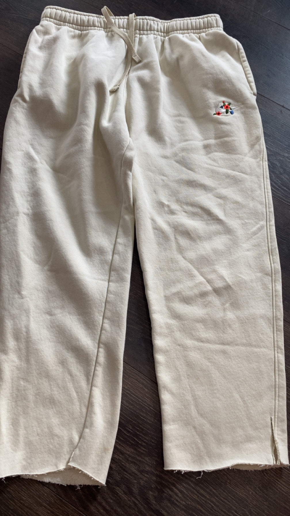 Nike medium.. bottoms have been cut, still normal length