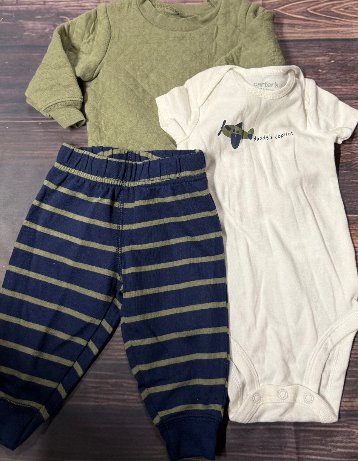 Carter’s 3-6m..staining on onesie