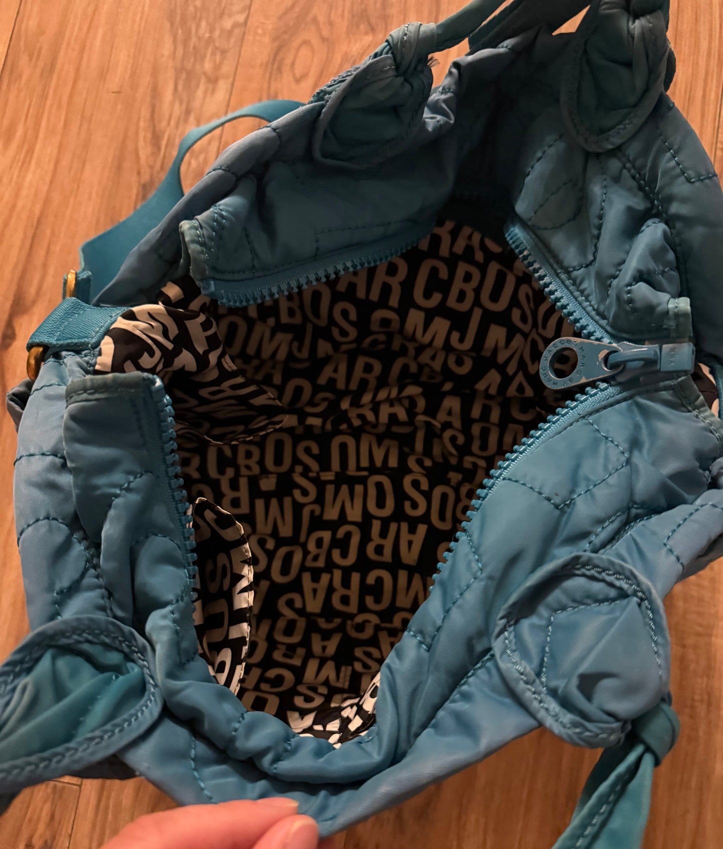 Marc by Marc Jacobs retails $250..inside in second pic