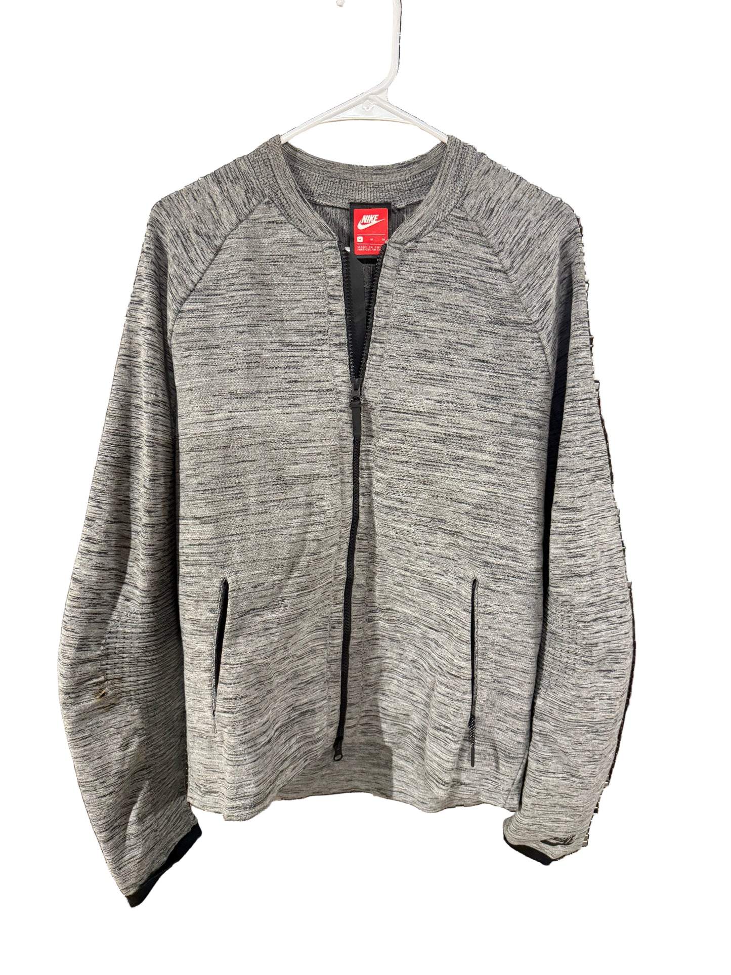 Nike medium..small spot on shoulder