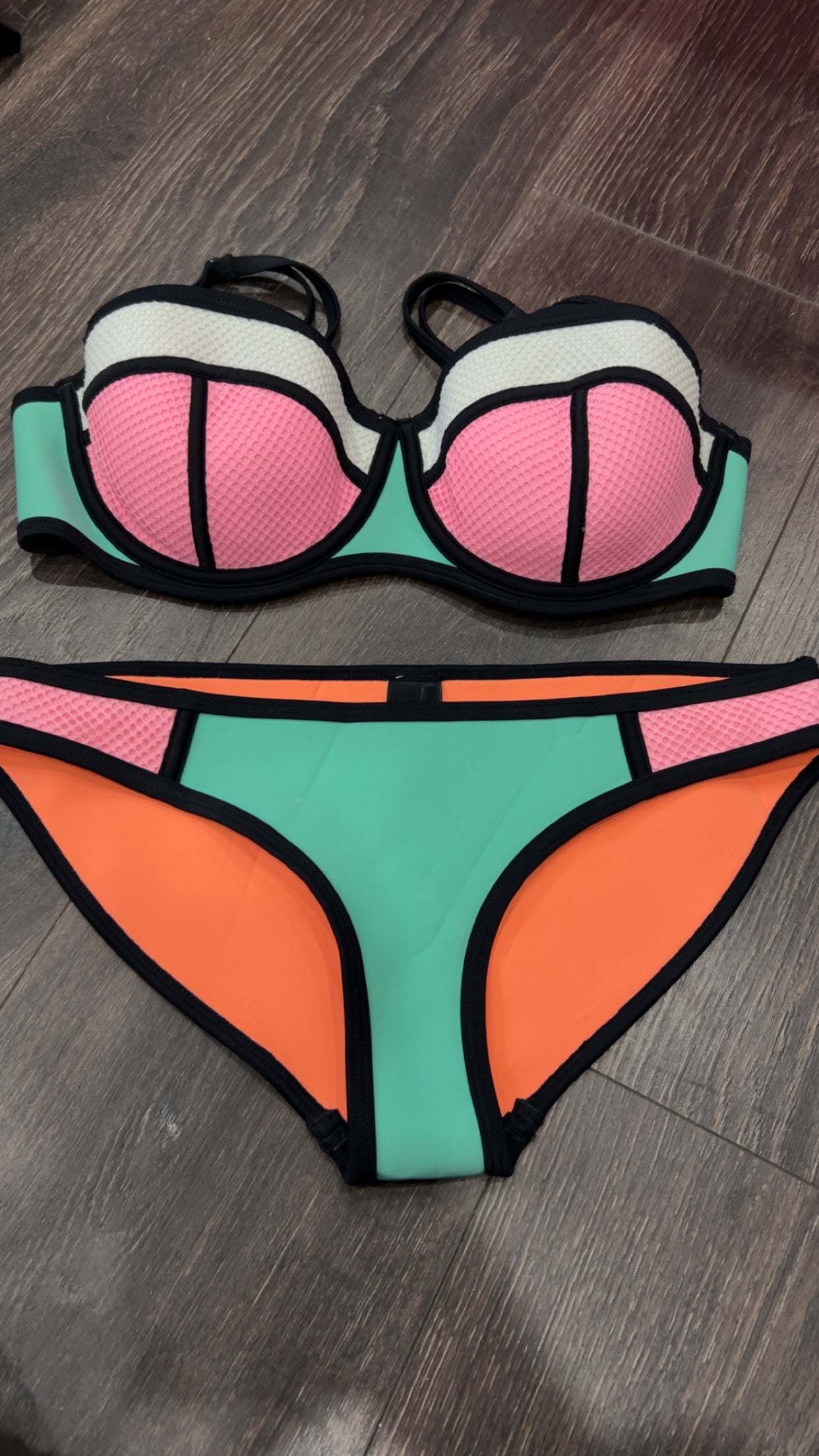 Triangl small ++ retails $119