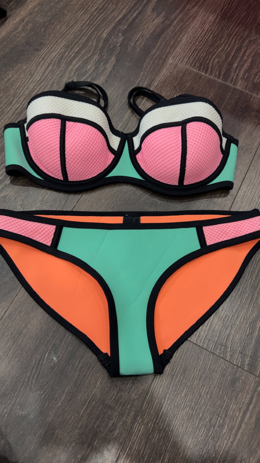 Triangl small ++ retails $119