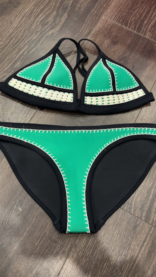 Triangl small + retails $119