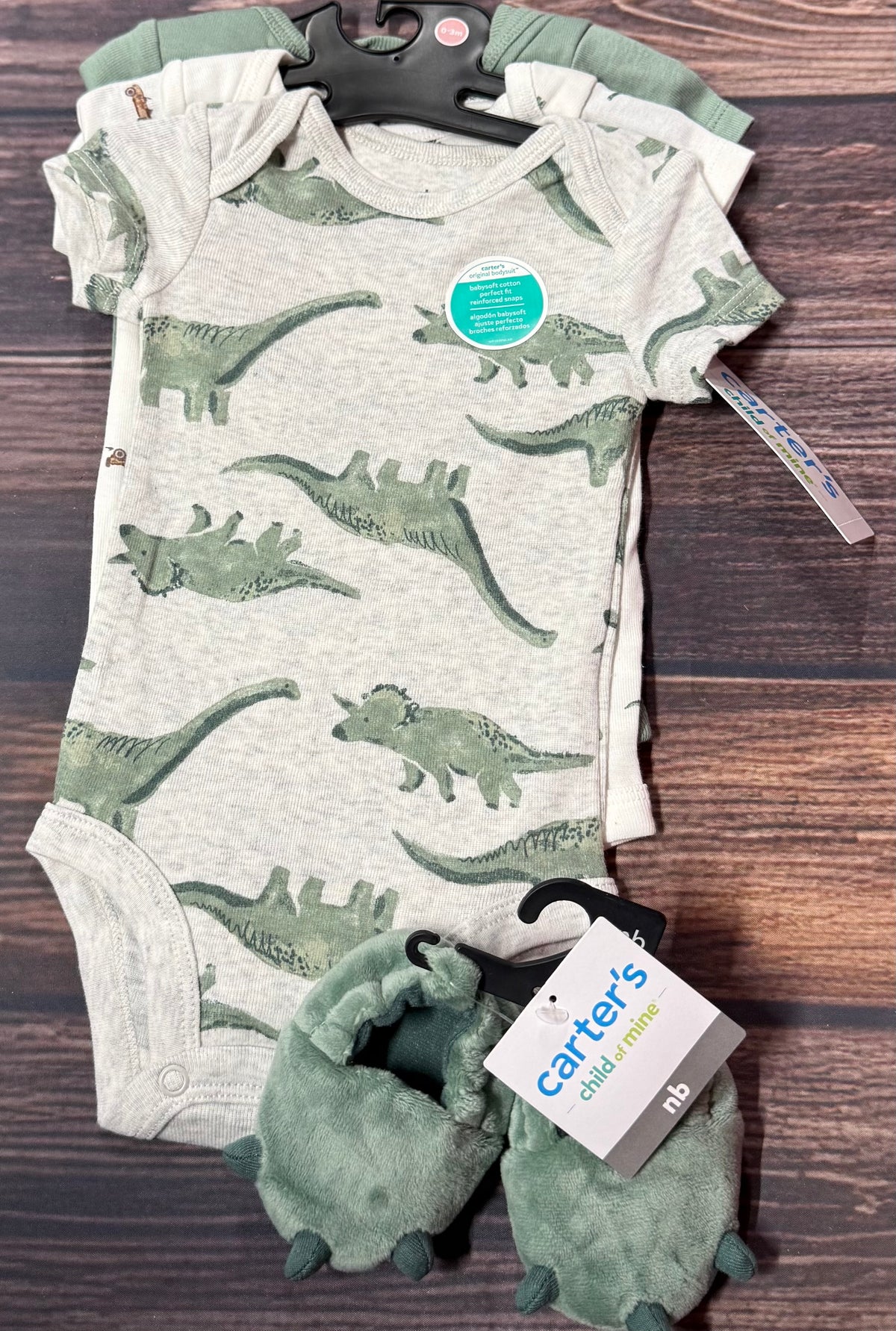 NWT Carter’s 0-3m/ newborn footies