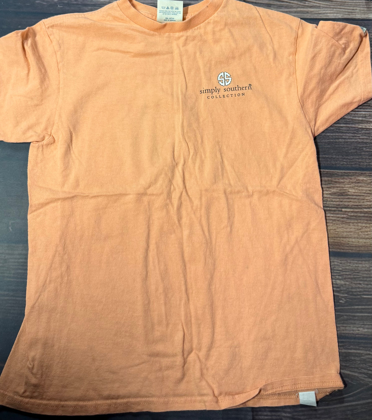 Simply Southern small..has small spots on front