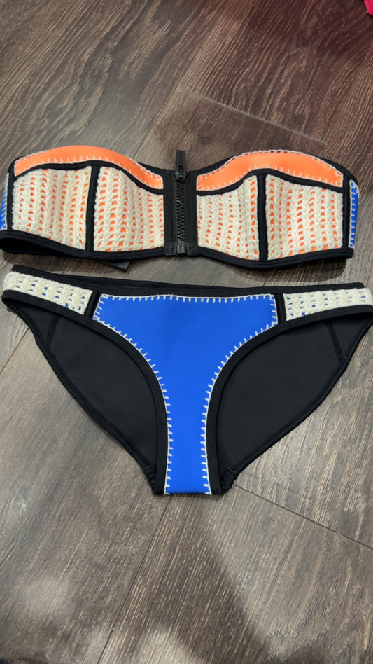 Triangl small + retails $119