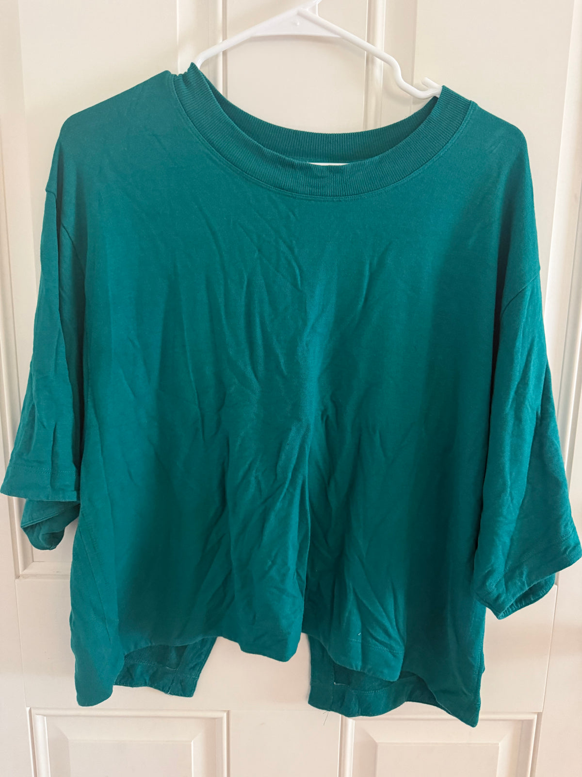 Athleta medium..small spots by shoulder..cute back!
