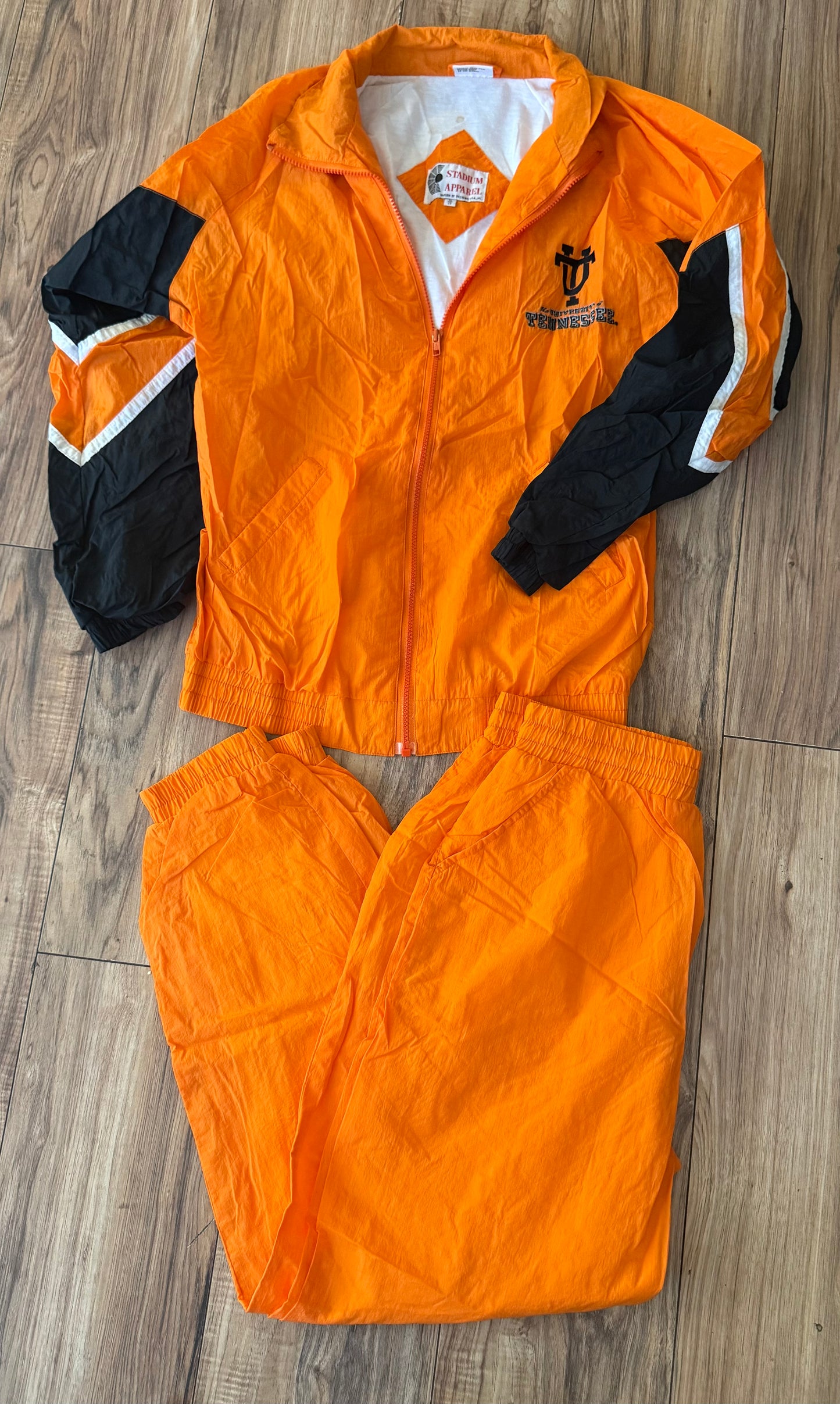 Stadium Apparel XL..has some staining and a hole in leg