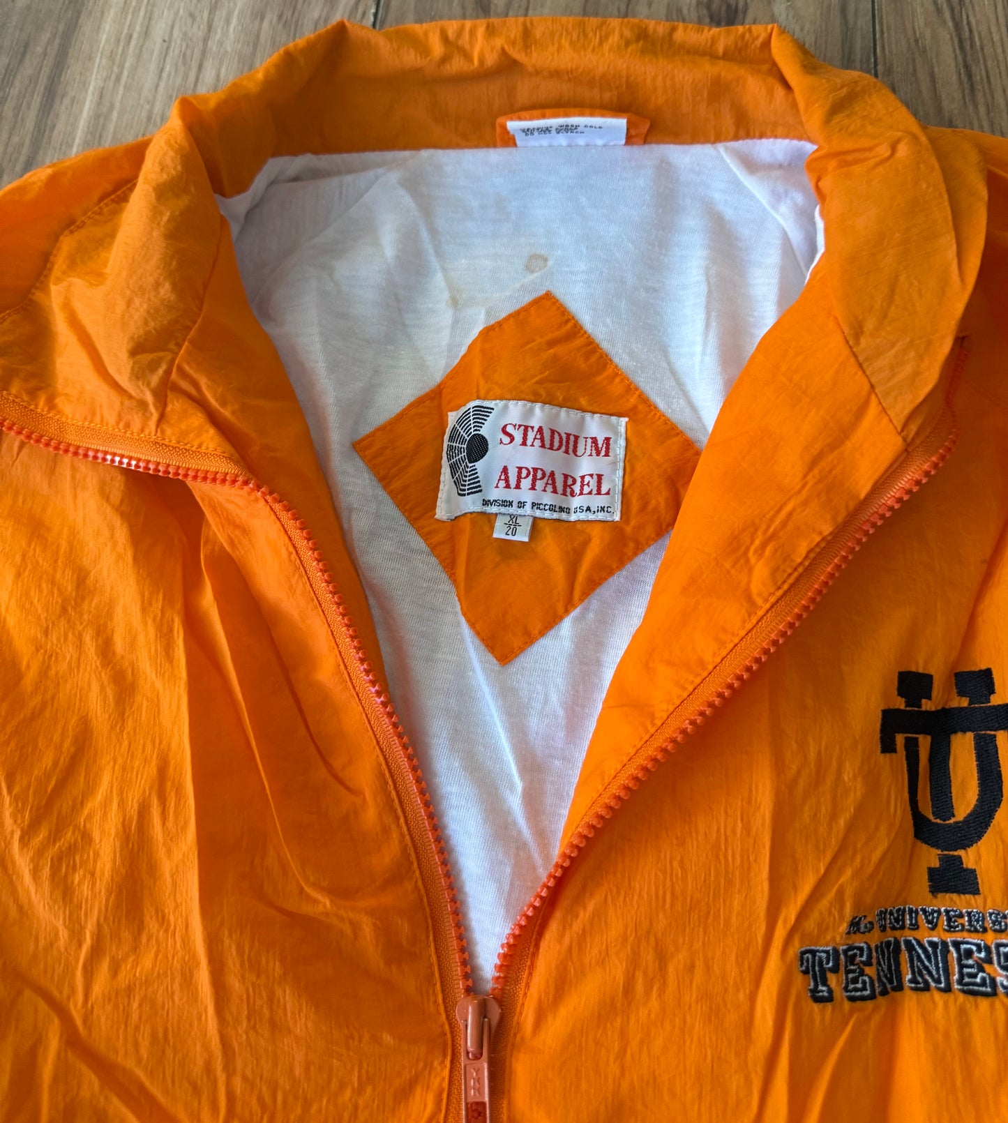 Stadium Apparel XL..has some staining and a hole in leg