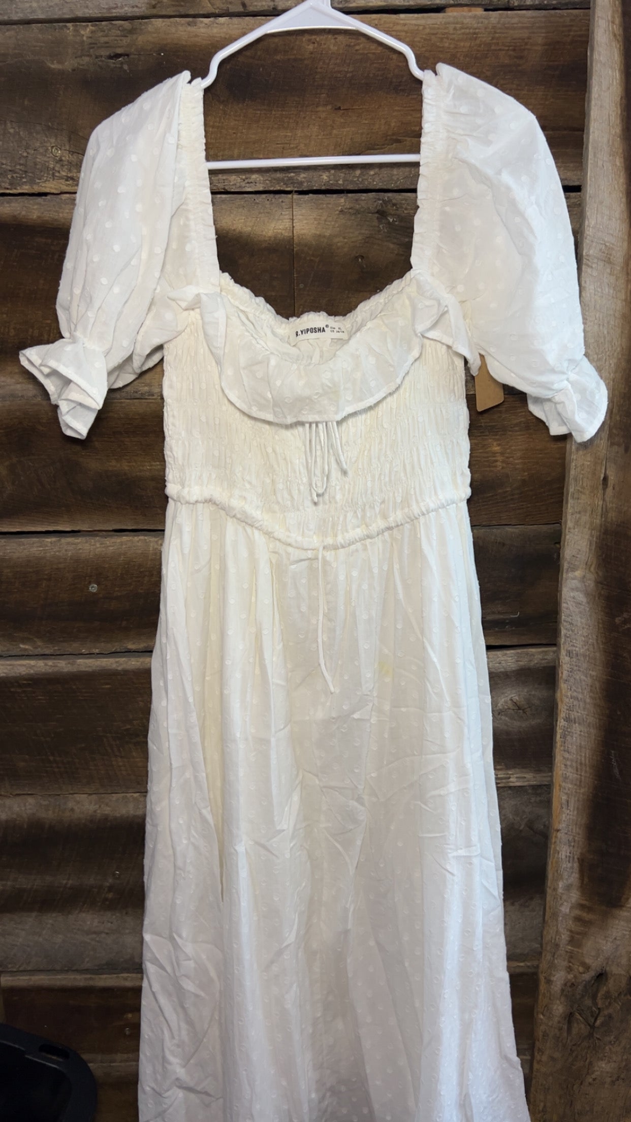 R. Yiposha size XL.. small spots that look like they will come out when washed