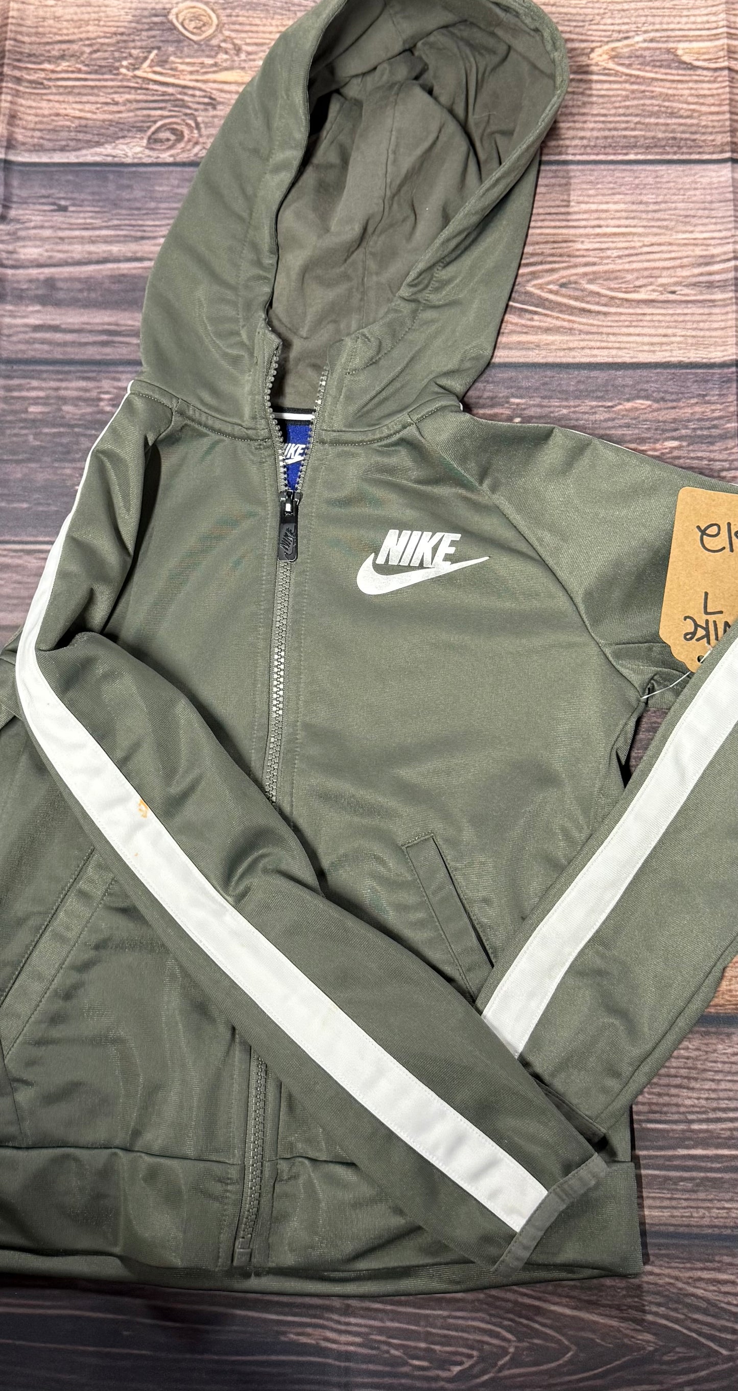 Nike 7..small staining on sleeve