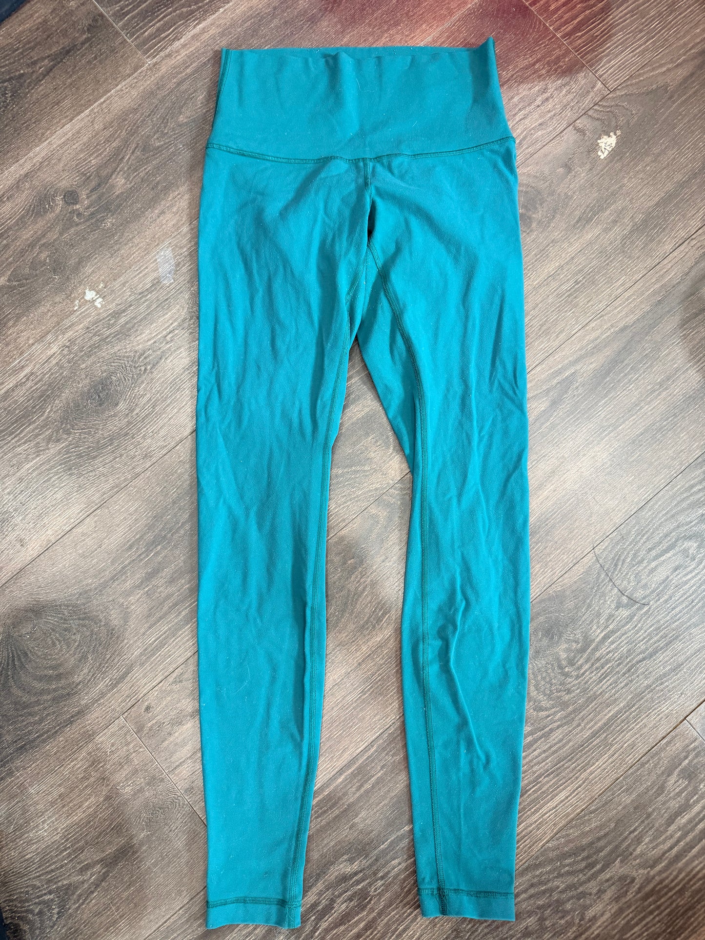 Lululemon size 8, has pilling and small spot